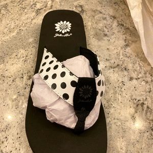 Yellow box flip flops White with black polka dots